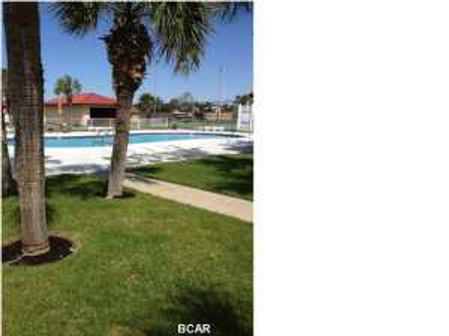 Located right in the middle of Horizon South, this 2 bedroom, 2 bath condo is adjacent to all the wonderful amenities this family friendly community has to offer - 3 pools, a kiddie pool, hot tub, tennis, shuffleboard, mini golf, community room, exercise room and game room with billiard tables are steps away. And being centrally located, it's a short walk to the beach. The downstairs master bedroom has a king size bed that was recently purchased. The second bedroom has 2 queen beds, walk-in closet and lockable storage room that could be used for an owner's closet. Fully furnished and ready to be enjoyed or rented. All information is believed to be accurate but should be verified by buyer.