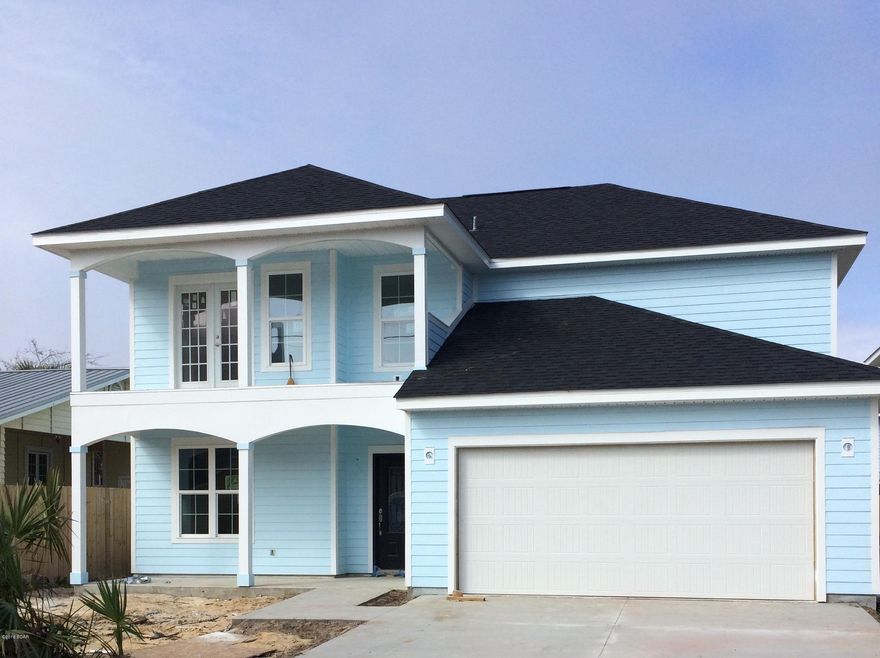 THIS IS A FABULOUS BEACH HOME! First, LOCATION IS EVERYTHING! Enjoy an easy stroll to the beach, plus just minutes to Pier Park's shopping, restaurants, renovated Amphitheatre, Frank Brown Recreational Park, Aquatic Center and just 20 minutes to the International Airport! Pull in the driveway and notice the great curb appeal, full landscaping with sprinkler system, too. Enter the stunning front door, step inside and the reaction is the same ''WOW!''. Notice the arched entry, elegant tile, gorgeous wood flooring, upgraded lighting, too! Step into the kitchen and another ''WOW'' moment. You'll love the cabinets, granite, stainless appliances, island, and so much working room! Home features 4 nice sized bedrooms, plus 3 beautiful baths. You will especially love the master suite with a huge walk-in closet, large elegant bath, and a private balcony where you can enjoy your "peek-a-boo view" of the gulf!  Finally, seller is offering a 10 year home warranty along with a wind mitigation report saving you money right up front on inspections and insurance! Call your realtor today for a private viewing!