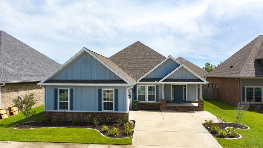 PRICE REDUCTION! This beautiful home is move-in ready and located in one of Lynn Haven's most desirable neighborhoods - the Villages of Mill Bayou, with incredible amenities, including a community pool, fishing pond, playground, picnic area, fire pit and a pavilion/gazebo AND kayak access to the bay not to mention street lamps and sidewalks in the entire neighborhood. Split floor plan with very open spaces, especially the great room! NEW ROOF and FRESH PAINT THROUGHOUT. The oversized master bedroom boasts a master bath with double vanities, private toilet closet and walk-in shower PLUS a huge master closet. Gorgeous kitchen with granite countertops and stainless appliances. Tucked behind North Bay Haven Charter Academy and close to everything you need for dining, shopping and more!