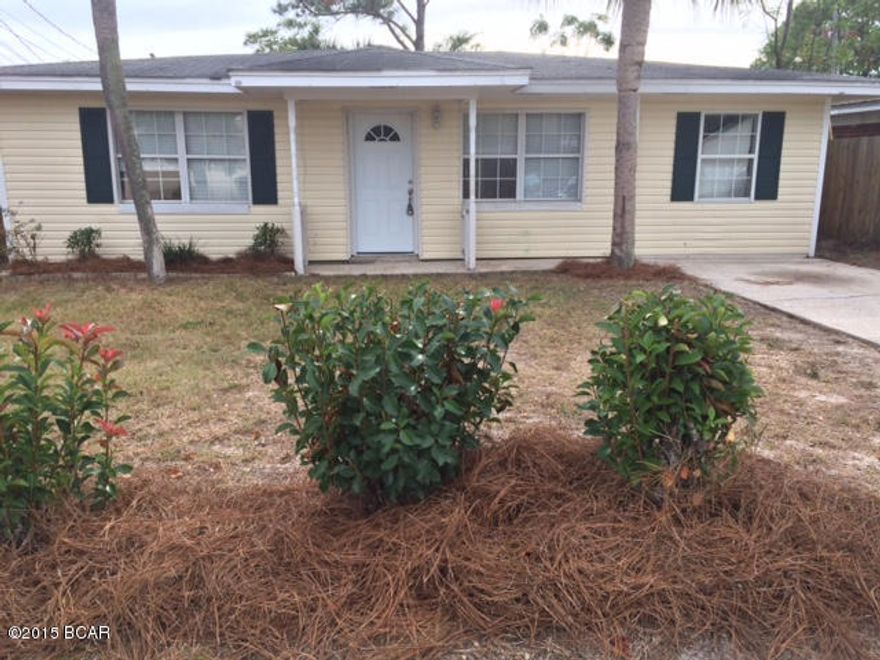 Being sold ''AS IS''  ALL TILE FLOORS, SCREENED IN PORCH, BIG FENCED REAR YARD WITH STORAGE BUILDING. This house is south of Grand Lagoon just minutes from beach. Great buy on a 4-br 2-ba ranch home close to beach and Capt. Andersons and Grand Lagoon.  BEST PRICED 4-BR ON THE BEACH PER FT. This is a brick home covered with vinyl siding. Split bedroom floor plan with private rear master suite overlooking fenced in rear yard. No carpet at all. Big master with lots of windows overlook fenced rear yard. Sun porch screened in. private setting. seller has moved out. Vacant EZ show.

SELLER WILL INSTALL A NEW METAL ROOF AT FULL PRICE ONLY!!!