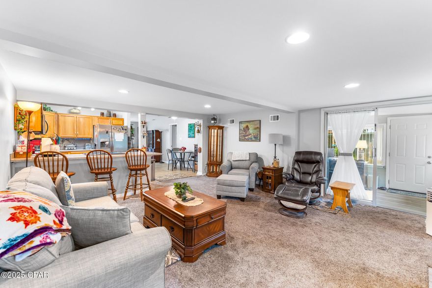 Renovated in 2019, this home features four bedrooms and two bathrooms with a split floor plan offering plenty of room for comfortable living. The interior includes an oversized laundry/utility room, an eat in breakfast area and bar, separate dining room, and a cozy entry way. Other highlights include a charming Florida room - perfect for a home office or playroom. The exterior features a separate out building/shop, a built in smoker, a fully fenced back yard and plenty of parking. The large back yard backs up to a city easement alley. This property is conveniently located near Tyndall AFB. Call today for your private showing.