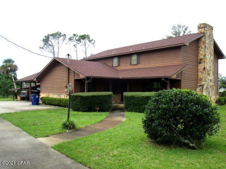 LARGE HOME IN THE HEART OF PANAMA CITY!  This home features over 3,000 SF and has already been gutted to the studs and waiting for a remodel! The home features a large Living Room with a stone fireplace, formal Dining Room off the Kitchen, a half bath, and an additional room that could be a a perfect Den for the family or a fifth bedroom.  The second floor has three additional bedrooms, a full bath and a spacious Master bedroom with a large walk-in closet, double vanity and separate shower.  The home had a new roof January 2019, and the exterior is in very good condition.   There was an inground pool, but it was filled in.  The pool equipment remains in a shed and the pool could possibly be returned to a working pool.  This home has had so much work already done that saves time and money!!