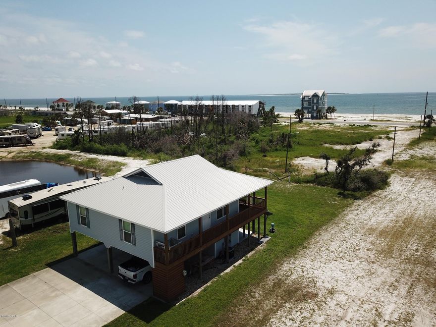 Awesome beach house in St. Joe Beach. Only 5 years old, in brand new condition and suffered minimal damage from Hurricane Michael. This home shows very well and will be sure to impress. It is full of upgraded features and includes an exterior cargo lift. The location is the best of both worlds; you're on a quiet street off the highway, but also very close to the beach and has amazing gulf views. Nice screened deck to enjoy the sunsets and there is a community pool in Summer Place with minimal dues of $800 a year. This is a small neighborhood and the pool is hardly ever crowded and usually is your own private pool without the costs. Sold furnished except a small list of exclusions. This location is just over a mile to Mexico Beach. Check out the 3D virtual tour.