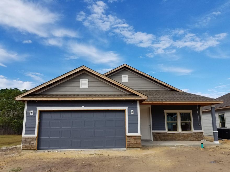 New Construction at Hidden Ridge! SELLER WILL PAY $5000 TOWARDS CLOSING COSTS!! Hidden Ridge is a New 21 Home, Secluded Subdivision in Lynn Haven off Hwy 390. Hidden Ridge has Underground Utilities, Paver Driveways, Sidewalks and Decorative Street Lights. This beautiful New Construction Home features 9/10 Foot Ceilings, 20 inch Porcelain Tile Flooring throughout Main Living Area and Bathrooms. The Kitchen has All Wood Cabinets, Granite Counter Tops with under Mount Sink, Breakfast Island and Whirlpool or Maytag Stainless Appliances. Some of the Standard Features include: Tremendous Master Walk-In ''Step Down'' Showers with 2 Shower Heads, 8ft Interior Doors, Crown Molding, Paver Driveways, Upgraded Carpet and Pad, 14 SEER Heat Pumps, Anderson LOW E Double Paned Windows, and a Security System. Put Hidden Ridge and this wonderful New Home at the Top of your List of Places to See.
Buyer should verify all that is important. Listing Agent has an ownership interest in this property. Seller is Licensed Fl. Realtor. **2023 Sq Ft., 4 Bed/2.5 Bath Available as well. *** Square footage and lot sizes are approx. from builder plans.