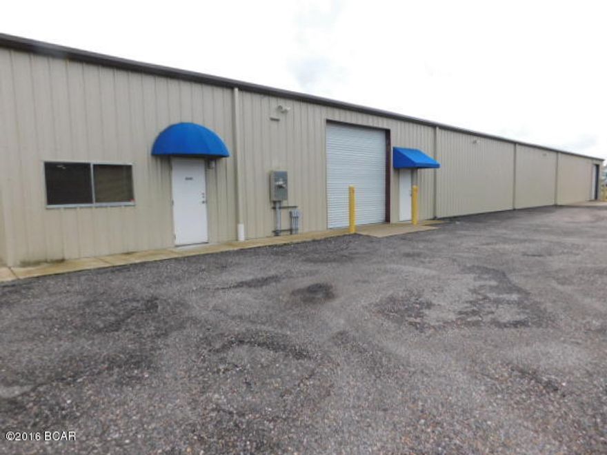 Located in the Bay Industrial Park off Hwy 231, ready for occupancy: 8500 sq. ft.building, 18'eave height, 20' at center, two 12' roll-up doors, three steel pedestrian doors. Of the 8500 sq. ft.  approximately 1000 sq. ft are heated and cooled office space; two restrooms; mezzanine storage area. Fed-Ex distribution within 1/2 mile of this industrial building.