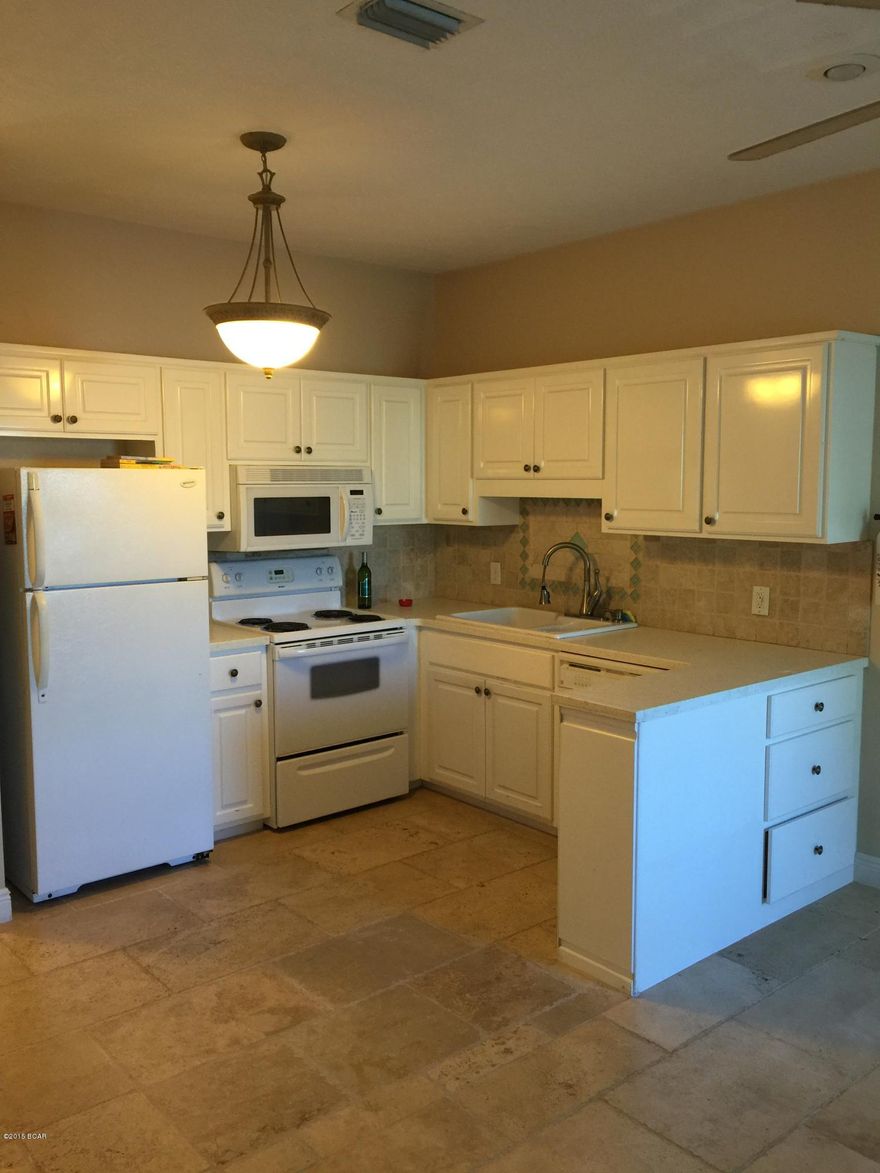 Beautiful 2 bedroom, 1 bathroom located on Bonita Circle. This property has carpet and stone floors. Lots of closet space in Master. Private balcony overlooking lagoon with one car garage attached to unit. Pets possible with approval. Garbage included!! Price reduced.