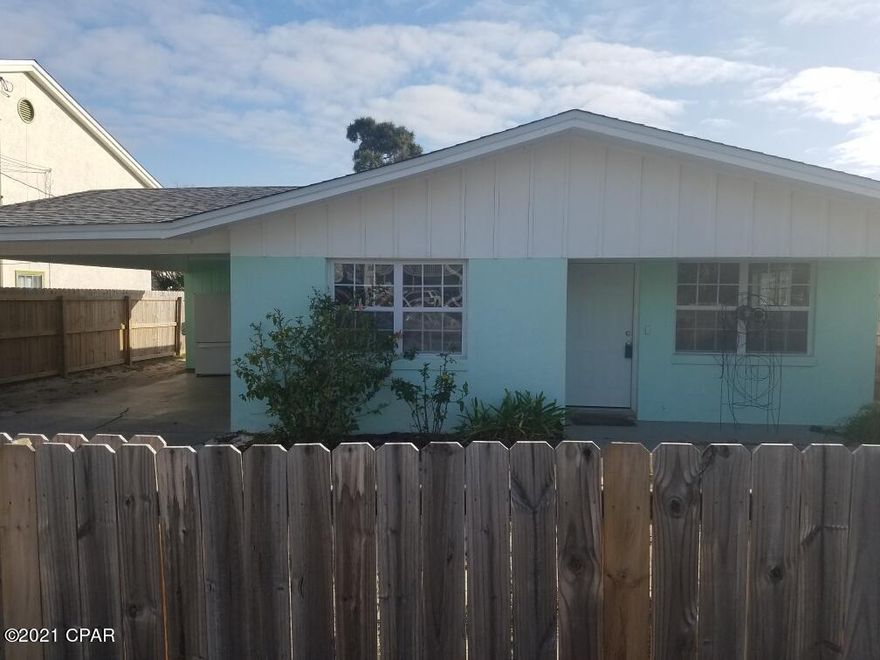 Adorable BLOCK home on the east end of Panama City Beach!!  This is great opportunity to own a primary home, second home or investment property.  Located walking distance to the white sandy beach and the boat dock at the lagoon with Gulf access.  Freshly painted, water heater 2019, AC/HVAC 2015 and re-roofed 2016 ...ready to move in!!  Large backyard with privacy fence and roll gate at driveway.  Available to show after March 23rd.