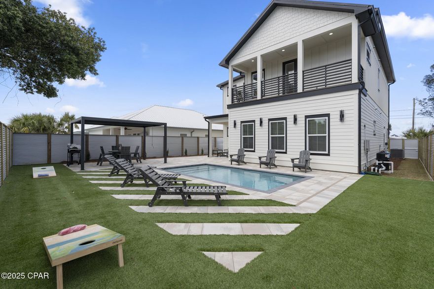 Back to the Market. Better then it was before. Priced to sell.
 Introducing a stunning brand-new two-story home in the highly sought-after west end of Panama City Beach, perfect for a residence or an exceptional vacation rental opportunity. Literally one house on the block connected to City sewer, no septic tank hassle!
This exquisite property has been expertly crafted by a reputable construction company and features a robust weather impact package along with a 10-year structural warranty, ensuring peace of mind for years to come.
You absolutely must see this remarkable home to fully appreciate its quality and charm.
 The expansive backyard boasts a private pool and gazebo, creating an idyllic oasis ideal for relaxation and entertainment. Plus, the driveway is equipped with an EV charging station, catering to the modern lifestyle.
Step inside to discover an interior that showcases the artistry of a renowned designer. Every piece of furniture, appliance, and decoration has been thoughtfully curated by a professional decorator, resulting in a cohesive and sophisticated aesthetic. Indulge in the elegance of Italian furnishings in the living and bedrooms, delight in the convenience of built-in bunk beds, and enjoy top-tier cooking experiences with premium Thor kitchen appliances.
This home isn't just ready for you to move in; it's a powerhouse designed to maximize your living and rental potential. Priced below its recent appraisal, this property is projected to generate an annual gross rental income of around $160,000.
Don't miss out on this incredible opportunity!