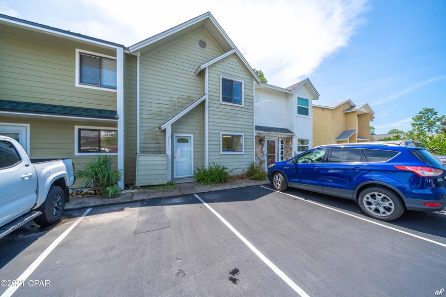 'CURRENTLY UNDER CONTRACT, SELLER ACCEPTING BACKUP OFFERS' Waterfront townhome situated on a pond in the gated community of Harbour Towne! Great rental investment or primary in the heart of Panama City Beach near the Hathaway Bridge with easy access to Panama City & the beaches. The neighborhood features two community pools and a clubhouse.

This townhome has 2 BR/2.5 BA with living space downstairs. All tile flooring throughout the first floor with half bath, kitchen opening to dining & living room, and laundry. The kitchen offers a gas range, refrigerator, and dishwasher with a window over the sink. Upstairs is the large master bedroom overlooking the lake w/  en suite bathroom and walk in closet. Additional large bedroom and closet w/ bathroom in the hallway. This is a great deal!