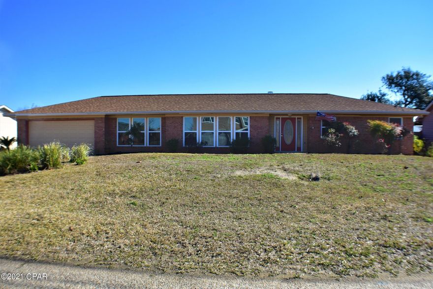 CURRENTLY UNDER CONTRACT, SELLER ACCEPTING BACKUP OFFERS. Lots of new with this Lynn Haven home... roof, septic, HVAC, kitchen, baths, tile, appliances, paint, windows, & more!  This 3BR/2BA home has an in-ground pool & a huge privacy fenced backyard making this an ideal family home!  The floor plan includes a living room, formal dining, family room with fireplace, & a breakfast nook in the kitchen.  You'll love the new cabinets, quartz countertops, & Stainless GE Profile appliances in Kitchen.  Both bathrooms have new vanities including TWO in the master.  There are engineered wood floors throughout the home which is not only attractive & versatile, but also easy to maintain!  You can access the patio & pool area from the family room, master bedroom, & the two car garage!  Don't le All info is approx and must be verified by Buyers if important.