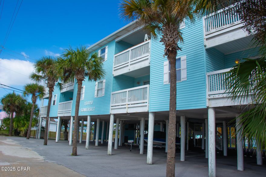 Experience coastal living at its finest in this fully furnished 2- bedroom, 2-bath condo, located on the first floor of an intimate 16 unit building.  This desirable end unit offers Gulf views and is approximately 200 feet from the white sandy beaches of the Gulf of America -- just step outside and stroll to the shoreline.  LOW HOA dues at only $350/month, this property is as practical as it is charming.  The interior features updated flooring, an in-unit washer and dryer, and a fresh, inviting layout that's perfect for vacation living or investment use.  The condo is currently operating as a vacation rental, making it a turn-key opportunity.  The building offers a fun Owners-Only crow's nest at the top - an ideal spot to relax, unwind, and take in stunning coastal views.  Under-building dedicated parking adds convenience, while the location adds character:  you're right next door to the famous Salty Goat Saloon, giving you easy access to one of the area's most iconic local spots. Whether you're seeking a beach getaway, income-producing rental, or both -- this condo delivers the perfect clend of comfort, charm and location.  Don't miss your chance to own your slice of the Gulf Coast!