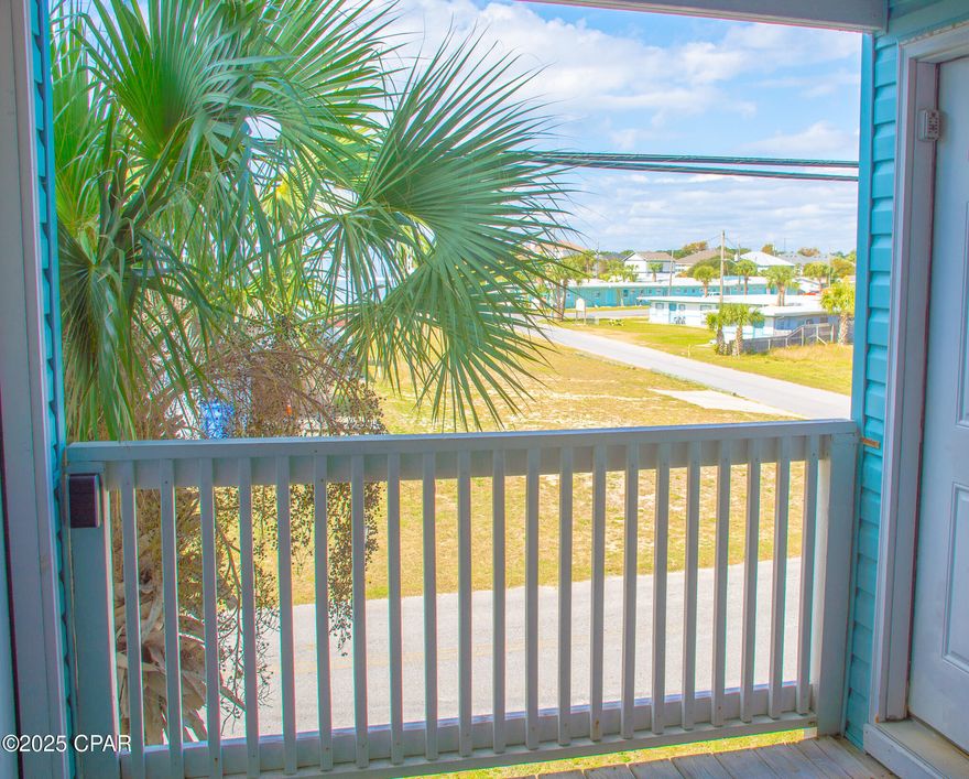 Experience coastal living at its finest in this fully furnished 2- bedroom, 2-bath condo, located on the first floor of an intimate 16 unit building.  This desirable end unit offers Gulf views and is approximately 200 feet from the white sandy beaches of the Gulf of America -- just step outside and stroll to the shoreline.  LOW HOA dues at only $350/month, this property is as practical as it is charming.  The interior features updated flooring, an in-unit washer and dryer, and a fresh, inviting layout that's perfect for vacation living or investment use.  The condo is currently operating as a vacation rental, making it a turn-key opportunity.  The building offers a fun Owners-Only crow's nest at the top - an ideal spot to relax, unwind, and take in stunning coastal views.  Under-building dedicated parking adds convenience, while the location adds character:  you're right next door to the famous Salty Goat Saloon, giving you easy access to one of the area's most iconic local spots. Whether you're seeking a beach getaway, income-producing rental, or both -- this condo delivers the perfect clend of comfort, charm and location.  Don't miss your chance to own your slice of the Gulf Coast!