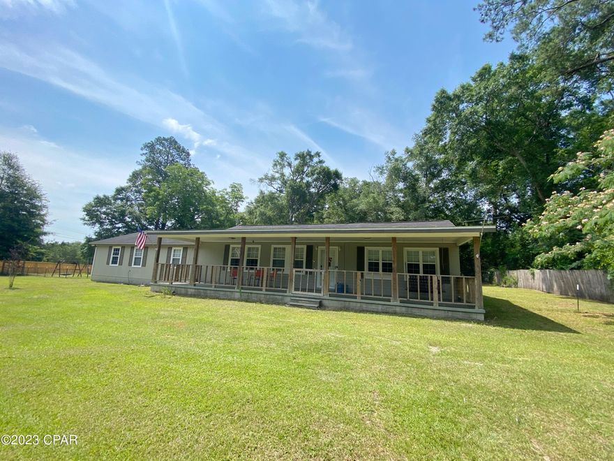 Nice ranch style home with 3 bedrooms & 2 full bathrooms. You'll love the spacious front porch that owners have secured for children or pets to play. The backyard is also fully fenced and gated making it pet friendly, and has a large 24' x 20' workshop with roll up door and electricity. Inside you'll find a large living space open to the dining area and kitchen with updated appliances and large walk in pantry.  This home has great storage space with his & her closets in the master bedroom and a generous storage room off from the laundry area. The master bedroom is large enough for an office space inside and boasts an ensuite bathroom. HVAC is 4 years old, & driveway has been repaved. Home has attached carport that can be used for parking or entertainment space.