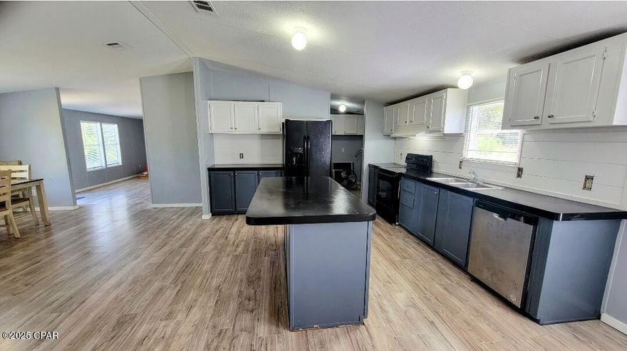 Renovated mobile home on 2 acres of land.