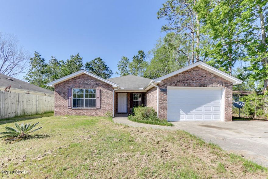 This beautiful 3 bedroom 2 bathroom brick home is conveniently located close to schools, shopping and dining. Highlights include an oversized one car garage, tile floors throughout, and a covered back patio. This affordable home provides a generous amount of living space for comfortable living. The spacious kitchen with a breakfast bar opens up to the breakfast/dining area. Enjoy your privacy in your large master suite featuring a private master bath. The additional bedrooms include plenty of closet space. The large back yard is perfect for entertaining family and friends. Enjoy BBQ's in your peaceful back yard under your covered porch. Don't hesitate to schedule your showing today!