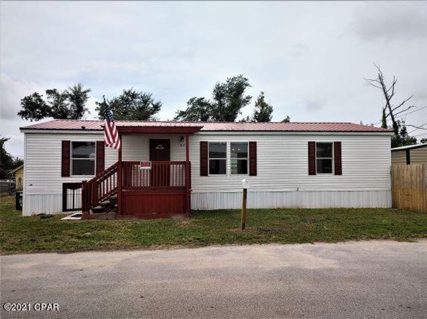 This newly remodeled 3 bed 2 bath doublewide offers an open spacious floor plan that has been completly remodeled. Vinyl Plank Flooring, new kitchen cabinets, granite counter new light fixtures, ceiling fans. Enjoy the front deck or the back yard that has privacy fence and a large shed. This immaculate double wide manufactured home sits on a corner lot and is waiting for you!! Located near all ammenites and short distance to both Bases, St. Andrews Area and beautiful Beaches.