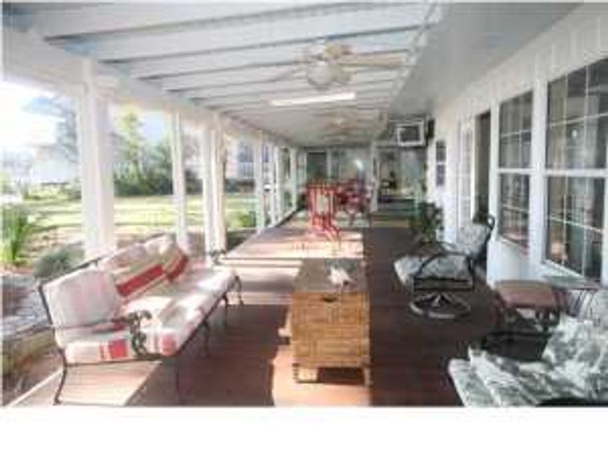 LENDER HAS APPROVED A SALE PRICE OF $485,000. This is a must see property. This 5 Bedroom, 3.5 baths sits on approximately 1 Acrea lot with 124 feet of frontage on beautiful Grand Lagoon. This 12 room home has a total of over 6,000 square feet with 3461 sq feet heated and cooled. In addition this property has a 29 X 24 double boat slip, a 84 X 22 garage capable of storing a large motor home or large boat plus your cars. It also has an office that joins the garage. It is a rare opportunity that a property like this comes on the market. All information is believed to be correct but should be verified by the Buyer. All offers should be made on an ''As Is'' contract and accompanied with a proof of funds letter or a pre qualification letter. Earnest Money deposits should be made to Bay Land