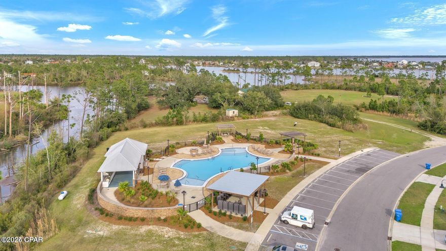 ASSUMABLE 2.75% rate for qualified Veterans with swapping our Certs!!! Reach out for more details. Welcome to this spacious corner lot in the highly desirable Bridge Harbor community with Bay views, directly across the street from the Bay! This home offers the perfect blend of comfort, convenience, and outdoor living. Take a dip in the community pool or take charge of the bbq area! Ideally located just 10 minutes from Tyndall Air Force Base and 35 minutes from the beautiful Gulf Coast beaches, this home provides easy access to everything you need for work, play, and relaxation. Plus, with grocery stores and restaurants just a short drive away, you'll have all the conveniences of daily life at your fingertips.
With the bay just across the street, providing breathtaking views and easy access to water activities like kayaking, paddleboarding, and fishing.
Inside, you'll find a thoughtfully designed layout with the primary suite conveniently located on the first floor, offering both privacy and easy access to the living areas. The master bath features a dual vanity and a spacious walk-in closet, while a half bath is also available on the main level for guests.
Upstairs, 3 additional bedrooms provide ample space for family or guests, along with a large second living room or flex space—perfect for a media room, office, or play area.
Additional features include a modern kitchen, plenty of natural light throughout, and a backyard with plenty of space for relaxing or entertaining. The Bridge Harbor community is known for its welcoming atmosphere, prime location, and close proximity to local shops, dining options, and more.
Don't miss your chance to own this exceptional home in Bridge Harbor! Schedule your showing today.