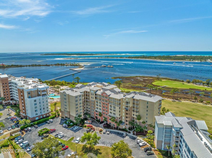 Two bedroom, two bathroom unit with large bonus/den. Unit features stainless appliances, tile floor kitchen/ living area and oversized balcony. The Grand features resort style pool, hot tub, fire pit, BBQ grills, fitness facility, community space and spectacular landscaping. Bay Point has 18-hole Jack Nicklaus design golf course, new marina is under construction with expected completion in May 2022, and 24 hour roving security. Unit has large separate storage unit located on the same floor as unit.