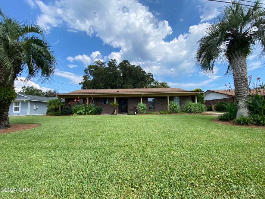 Charming All-Brick Home on Spacious, Landscaped Lot.  Just needs a little TLC.

Discover this inviting all-brick home situated on a beautifully landscaped, oversized lot in a serene neighborhood. The property features a separate, cooled studio with an attached workshop area, complete with power, water, and a working toilet—ideal for hobbies or a home business.

The fenced backyard is a private retreat, boasting a storage shed, a variety of fruit trees, and a pull-through driveway offering extra parking space. Inside, you'll find a large, open living room highlighted by a wood-burning brick fireplace and built-in bookcases.

The home includes 3 bedrooms, 2 full bathrooms, a dedicated office space, and an inside laundry room. Enjoy the convenience of tile flooring throughout and a spacious, screened-in back patio. Additional features include hurricane fabric window coverings and the benefit of no HOA fees.

Don't miss out on this gem—schedule your visit today!