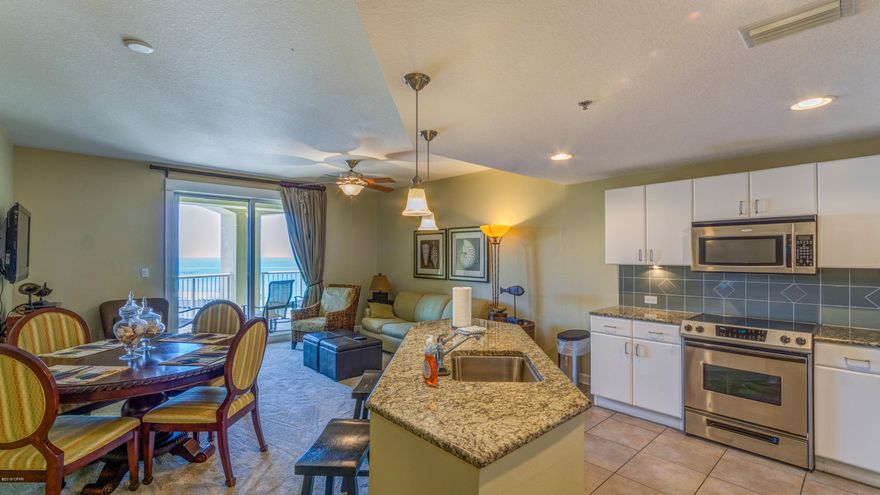 Located in one of the most desirable properties on the beach Grand Panama Beach Resort, this fifth floor condo has a stunning view of the Emerald waters of the Gulf of Mexico as well as the skyline of Panama City Beach. This fully furnished one bedroom, two bath unit also includes a bunk area located in the hall, and a sleeper sofa in the large living room. This spacious unit can easily sleep six! This unit also features a large kitchen with an island, and private balcony perfect for relaxing and sight seeing. The Grand Panama Beach Resort offers luxurious amenities such as two pools, hot tubs, fitness facility, grilling area, tiki bar and more. This resort is also near great dining and tourist attractions! All information believed to be correct, but should be verified by the buyer.