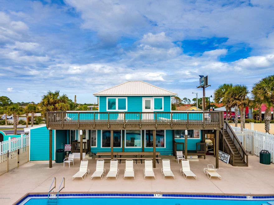 CURRENTLY UNDER CONTRACT, SELLER ACCEPTING BACKUP OFFERS  Fantastic townhome just across from the heated pool and shuffleboards. This home has been upgraded and renovated! plantation shutters, new front door, hurricane shutters,hvac-3 yrs old,new windows and more! no other home has such a nice covered patio for entertaining and relaxing! Kitchen has a moveable island and new countertops. lots of cabinet space! 3 bedrooms with an office space or bunk area. 2 baths upstairs &1/2 bath down. storage area! lots of upgrades to this awesome home! short term rentals are allowed. gulf front pool, tennis courts, mini golf and more amenities than most any other on the beach. this unit will be a great home or rental unit. its a must see!!