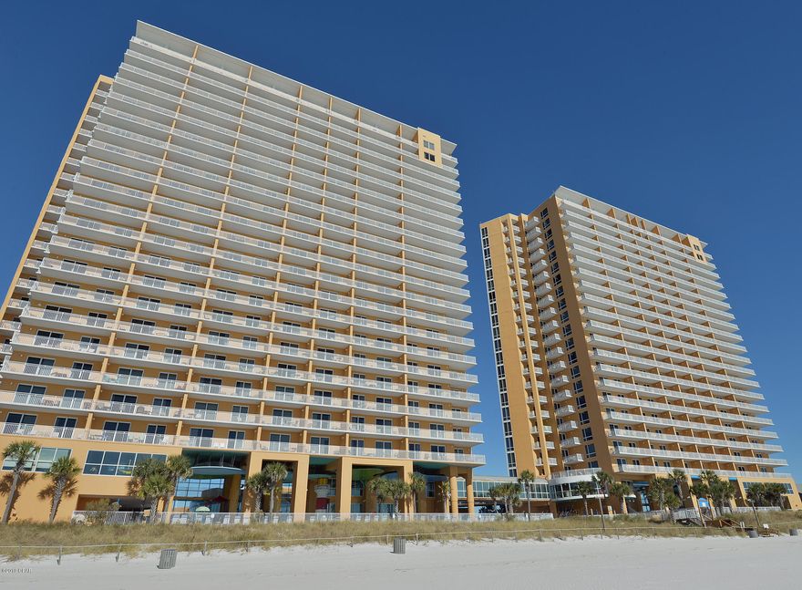 The best of the beach at Splash, located on the West end of the gorgeous beaches of Panama City. This ''Paradise'' floor plan with a lock-out suite conveys fully furnished and rental ready. This unit is a POWERHOUSE RENTAL!!! Because of the lock-out, the unit can be rented as a large 3bed/3bath or a combination of a 2bed/2ath and 1bed/1bath. Such flexibility helps you maximize your rental income potential! A coveted corner location, this condo boasts amazing Gulf views from inside and outside - extra windows on the side to maximize your views from the inside and three separate balconies providing plenty of vantage points on the outside. This prime 1st floor location is the ideal elevation in the stack - no waiting for elevators means more convenience and greater demand from a renters! This stunning property is finished with 9 foot ceilings and granite counters in the kitchen and bathrooms! All three bedrooms, the Master Suite, Lockout Master Suite, and Guest bedrooms have access to their own private baloneys and beautiful Gulf views. Nearly the lowest $/sq.ft HOA dues on the beach! in Splash, HOA dues are the same for every floorplan so quarterly HOA dues for this huge 1702sq.ft condo are $1,560.00, the same as they are for the 884sq.ft, 1Br floorplan...in essence your buying two condos with the same HOA fee exposure as you'd have if were to buy just one! Splash's incredible location with outstanding on-site amenities create a resort which is unique to Panama City Beach. Amenities include: Over 400 feet of pristine Gulf front, two distinct water-park environments, including a kids' pool park with water-slides, interactive water toys, a lazy river ride, ''dive-in'' movie theater, arcade, state of the art fitness center, a pool and Jacuzzi just for the adults and a poolside bar and grill. All this plus covered garage parking, a beach apparel/surf shop and on-site rental management & check-in desk. Just minutes to all the best restaurants, shops and entertainment and of course exciting Pier Park!