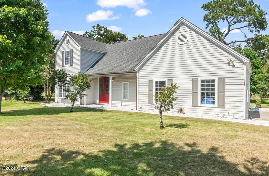 'CURRENTLY UNDER CONTRACT, SELLER WILL CONSIDER BACKUP OFFERS' Motivated Seller bring all offers! WELCOME To 164 Marlin Circle, This Cape Cod style home is located in the gated community of Bay Point. This home offers a 2.875 assumable VA mortgage! You'll love everything about this gated, waterfront community that offers, golf, tennis and a marina. This stunning home offers three Bedrooms, two full Baths and two half baths. The large foyer is introduced via stately beveled glass doors where you then view the stunning wooden stairway that leads to the three bedrooms, and two full bathrooms upstairs, and two of the bedrooms offer views of the pond.  Spacious open concept kitchen with granite countertops and gas stove. The kitchen offers lots of cabinet space and is perfect for entertaining. This home also offers a wood burning fireplace in the dining room. A plus is that there is a back owner's entrance gate off Thomas Drive making it easy to access restaurants, shopping and the beautiful beaches nearby. This home is a must see. Call for more information today.