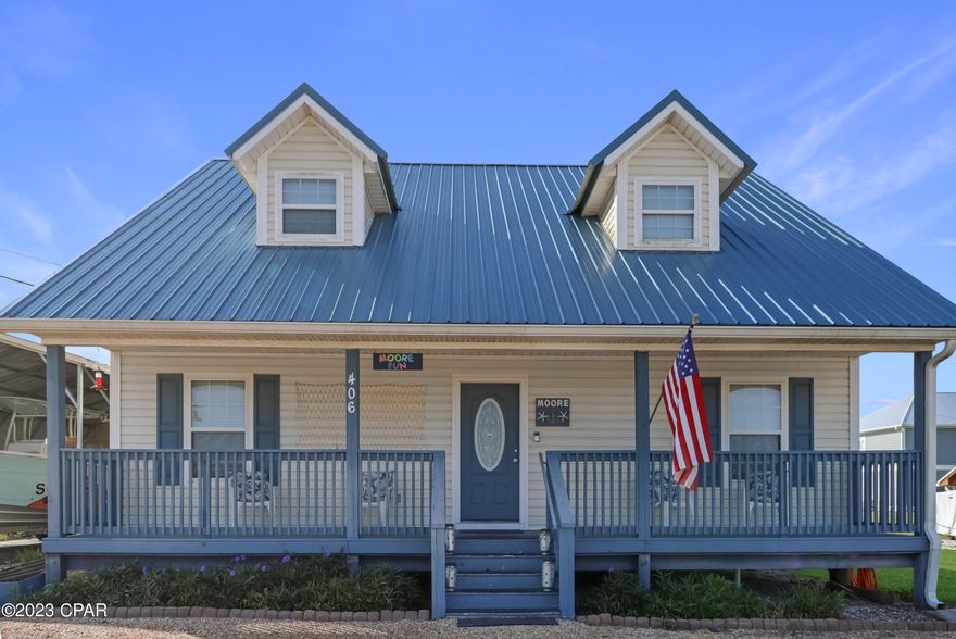 Florida Cottage home located about 4 blocks from the Dedicated Beach in Mexico Beach, Florida. This 3BR/2B home with 1,701 SF heated & cooled and has a large covered back porch. The kitchen has a long countertop with white cabinets, stainless appliances and a large walk in pantry. There is also a firepit in the back yard and a carport with storage room with electricity. No HOA. X Flood Zone.