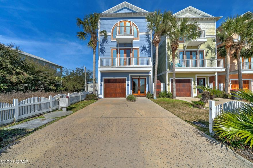 CURRENTLY UNDER CONTRACT, SELLER ACCEPTING BACKUP OFFERSFantastic WATERFRONT home on Grand Lagoon.  This home has everything you would desire in a waterfront home.  Inside this 4 bedroom 4 bath home has a hydraulic elevator that reaches all floors, solid Brazilian Cherry flooring, 10 foot ceilings, 8 foot doors, a designer kitchen with an oversized Wolfe range and oven, Subzero refrigerator, Bosch dishwasher and a built-in ice-maker.  All bedrooms have balconies overlooking the Gulf of Mexico or Grand Lagoon and each has its private bath with Jacuzzi tubs. For convenience there are 2 laundry rooms one of the 1st floor and one on the 3rd.  The backyard offers an inground, heated saltwater pool, outdoor kitchen, lanai, boat dock to accommodate almost any sized boat with electric water cable all windows and doors are hurricane rated and there is a whole house generator.