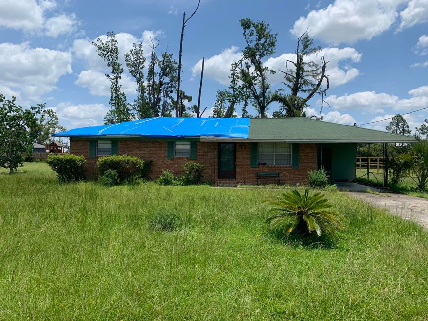 3 Bedroom 1 and Half Bath in Lynn Haven! This home is ready for your imagination. Newer AC, Brick Exterior, Oversize Lot, and much more. Buyer to Measure if important.