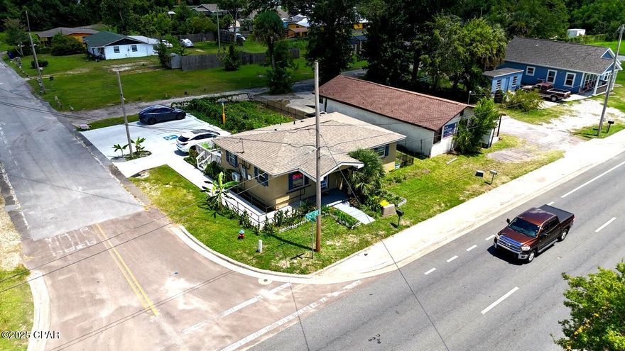 LOCATION, LOCATION, LOCATION! This centrally located corner property on a high-traffic road offers excellent visibility and versatility â” ideal as a private residence or to continue being used as a business, with proper permits already in place. The property features laminate flooring (installed in 2021), a new roof (2020), and a new central HVAC system (2024). A commercial-grade parking lot was recently added, providing ample parking in the rear for clients, employees, or guests.