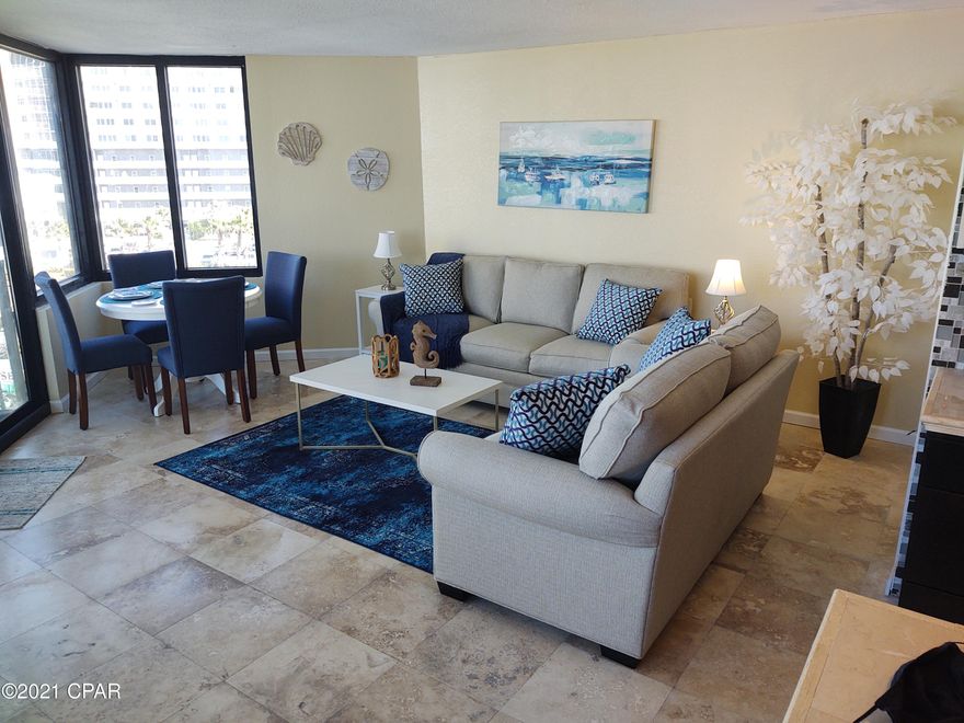 This completely professionally updated unit features fresh paint ,beautiful Travertine floors and walls for easy cleaning,  new stainless appliances in the redesigned kitchen space, new bath ,featuring a glassed in shower, vanity, sink and lighting. Unit comes furnished with tasteful high end furnishings, all brand new with newly added sleeper sofa that allow for 4 guests to enjoy the calm and openness of this affordable beach getaway as well as amazing gulf and sunset views this condo offers. One of the nicest units in the building, whether purchased as a second home or a rental you won't be disappointed with all this Gulf front Resort has to offer. The Resort recently underwent a major renovation to the buildings and common areas that included new windows and balcony doors in the units. This unit is being sold with a home warranty.