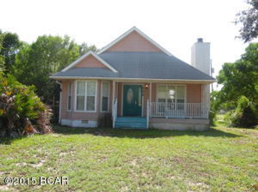 OMG!!Awesome opportunity in Santa Monica Beach. This 3 bedroom 2 bath home is down the street from the Santa Monica Deeded Beach. This is one of the most sought after communities on the West-end of Panama City Beach.This home  has a Fire place, 2 decks, detached double car Gargage, Large green house(12x20) and all this on a corner lot just  down the street from the Santa Monica Deeded Beach.