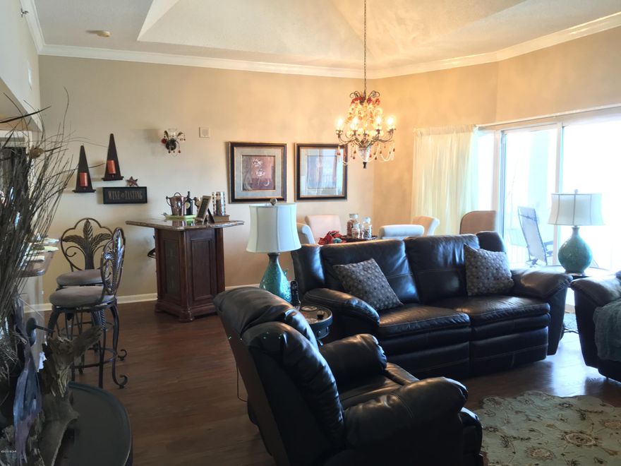 Owner finance on Penthouse at Long Beach Resort.  Vaulted Ceilings in the Living and Dining Room and Both bedrooms facing the Gulf.  This condo is luxuriously appointed and has to many upgrades to list.  This condo has been held as a non rental during the current ownership and is in like new condition.  Turnkey key and spacious enough as a primary residence, second home or income producing rental income property. Like kind 2BR penthouse owners are realizing gross rental revenue of approximately $55,000 annually through vrbo.  Long Beach Resort is sought after for its 1300 linear feet of beach frontage, being security gated, its three pools one if which is a tropical lagoon pool with waterfall, The Hangout Bar and Grill by the lagoon pool serving food/drinks.  All Bedrooms face the Beach.