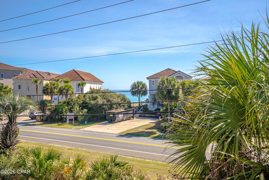 Welcome to this beautiful coastal home located on the desirable west end of Panama City Beach, close to 30A/Rosemary Beach, in the gated community of La Valencia.  Designed with a private beach resort feel the home is perfectly positioned directly across the street from the beach. This spacious 3 or 4 bedroom, 3.5 bathroom home offers gulf views, great indoor and outdoor living spaces, and a layout designed for relaxing and entertaining. The main living area features an open kitchen, dining, and living room layout that is bright and inviting. The kitchen is fully stocked and has custom cabinetry, generous counter space for meal prep or entertaining, and bar seating for four adjacent to dining seating for six. Just off the living room, you'll find a large covered balcony with gulf views, creating the perfect spot for morning coffee, evening sunset/cocktails, or enjoying that beachy breeze and the sounds of the surf! The primary suite is spacious and filled with natural light, with a private balcony so you can step outside and take in the views anytime. The ensuite bathroom features a dual vanity, soaking tub, and separate shower, creating a comfortable retreat. Downstairs, the home offers a separate living area complete with a sitting area, dining/game table, and wet bar with sink, mini fridge, dishwasher, ice maker, and microwave. This flexible space is perfect for entertaining after a beach day, serving as a fourth bedroom with sleeper sofa and private kitchenette, or creating a fun bunk/hangout area for kids. There is also patio access, making it easy to enjoy the outdoor space. The home features tile flooring in the main traffic areas downstairs and hardwood flooring in the main upstairs living areas, adding convenience for cleaning and durability!  Located in the gated La Valencia community, residents enjoy wonderful amenities including a heated owners pool, hot tub, clubhouse, fitness center, second gulf front pool,  private gated beach access, and a tennis/pickleball court. The clubhouse is complete with kitchen, restrooms, and gaming set up perfect for hosting game/poker night. The second pool is gulf front and has beautiful views of the Emerald Coast as well as restrooms and golf cart parking for added convenience. The location truly cannot be beat! You are conveniently located near Pier Park, the scenic 30A corridor, shopping, dining, and entertainment. Everyday conveniences are also close by with Aldi, Publix, and Walmart just minutes away.

With short term rentals allowed, gulf views, beach access directly across the street, and fantastic community amenities, this property offers a great opportunity for a primary residence, second home, or vacation rental investment in a wonderful area of Panama City Beach! Come see!