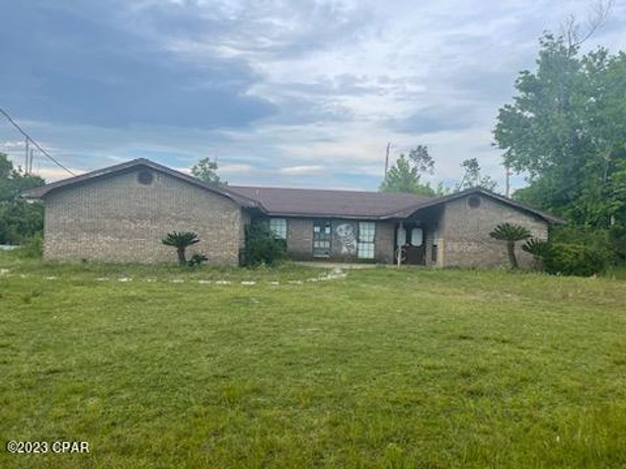 What an Opportunity waiting for you!! Located in Panama City is  2.07 acres!! There is a brick home on the property that must be torn down or raised at the buyers expense. The county will not issue any permits to repair the home, therefore selling this as land.  There is a pool at the property, that needs work. Cash offers only please. Located around the corner from Bay Haven Charter Academy, all the shopping Panama City has to offer plus easy access to the Worlds most beautiful beaches! Call today for more information!!