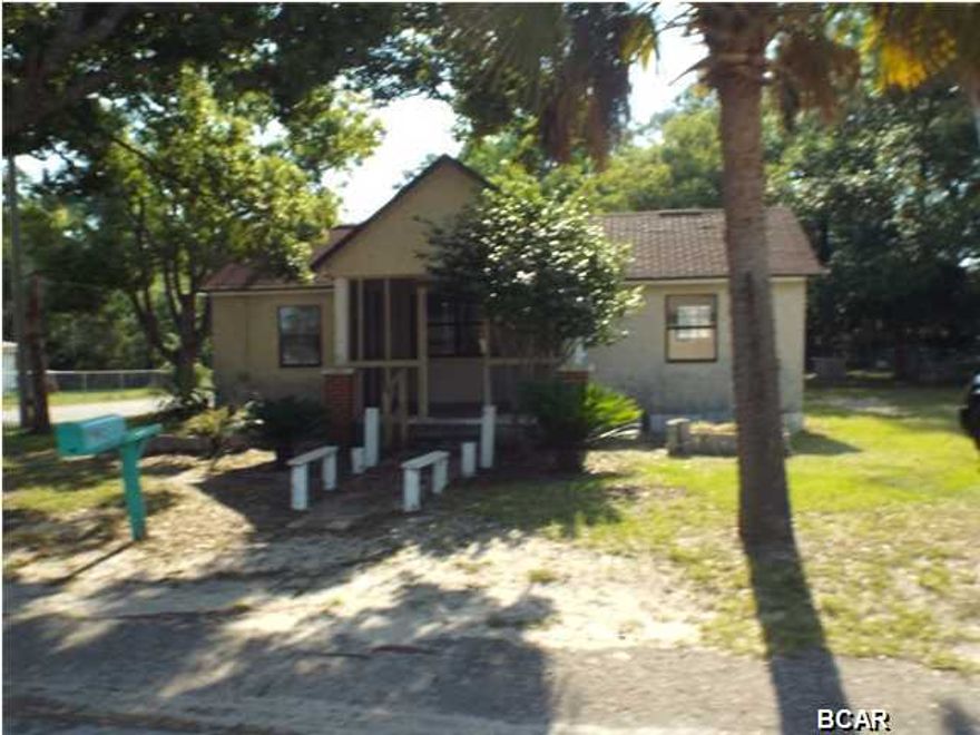 Two bedroom One bathroom house on a large 75x140 corner lot needing some TLC offered as is. All sizes are approximate please verify accordingly