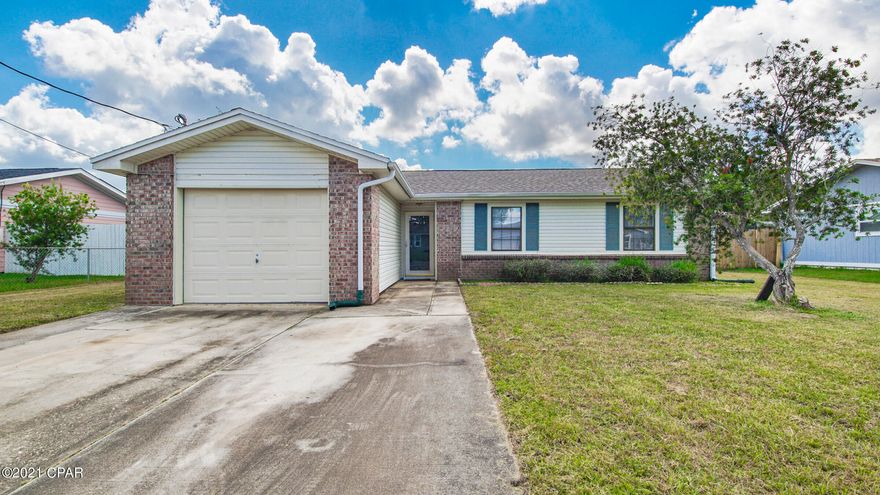 Well maintained house in the heart of Lynn Haven! This cute home features all tile floors, new roof (2019), new water heater (2019), spacious living room w/never sliding glass doors leading to a nice Florida Room & large kitchen with attached dining room. You will love the space in this house! Kitchen boasts lots of cabinetry and newer appliances. The bedrooms are great size and the main bedroom features an attached full bathroom. Outside you'll love the lush green grass, large back yard, and privacy fence. The house has an oversized one car garage that has washer & dryer hook ups and plenty of room to store an extra vehicle or lawn and garden equipment. Lots of storage in this house! Located 20 minutes to Tyndall Air Force Base, minutes to dining, shopping, parks, and great schools.