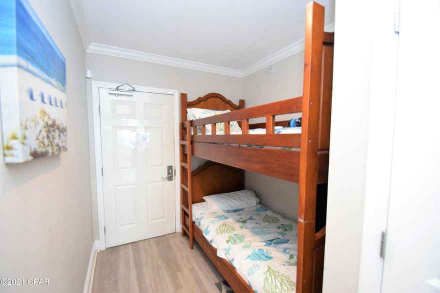 Looking for a lower floor condo, then this is it. Nice two bedroom 2 full bath condo with built-in bunk beds , located on the 2nd floor for great views and easy access. Large Gulf-Front Master Bedroom with a Bay Window offers beach and sunset views. Plus There is a spacious Guest bedroom. The Kitchen has Granite counter tops, with plenty of cabinets and a Breakfast Bar, Fully furnished and a great rental. Enjoy the views from the Sky Bar located in the

walkover. Starbucks is onsite. Multiple swimming pools. A Pool side tiki bar, Fitness Center. high speed elevators, Parking Garage. Close to Pier Park, Dining and Entertainment. The Seller is requiring that the Buyer honor the 2021 rentals that are already booked. All information is believed to be correct but should be

verified by the buye