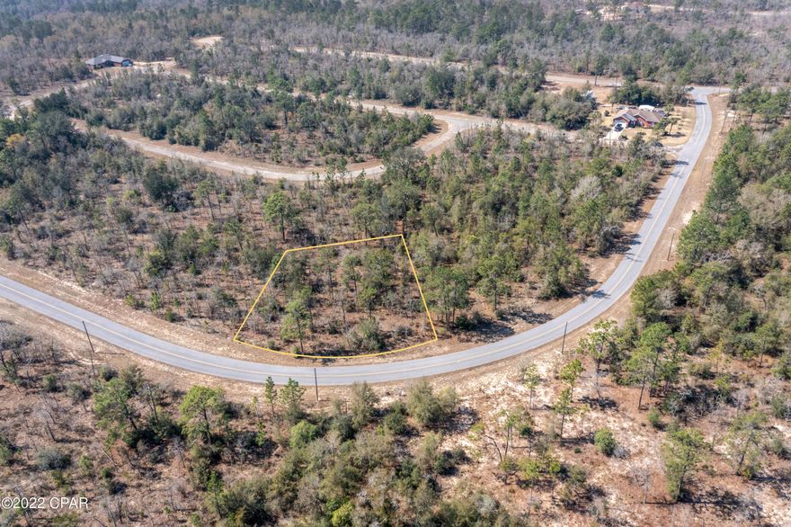 This lot is located in Sunny Hills and would be a great home site!  Sunny Hills features a golf course and many nice lakes.  The seller of this property has a survey and has already completed a perc test of the soil.  Just waiting for you to build your dream home on this parcel!