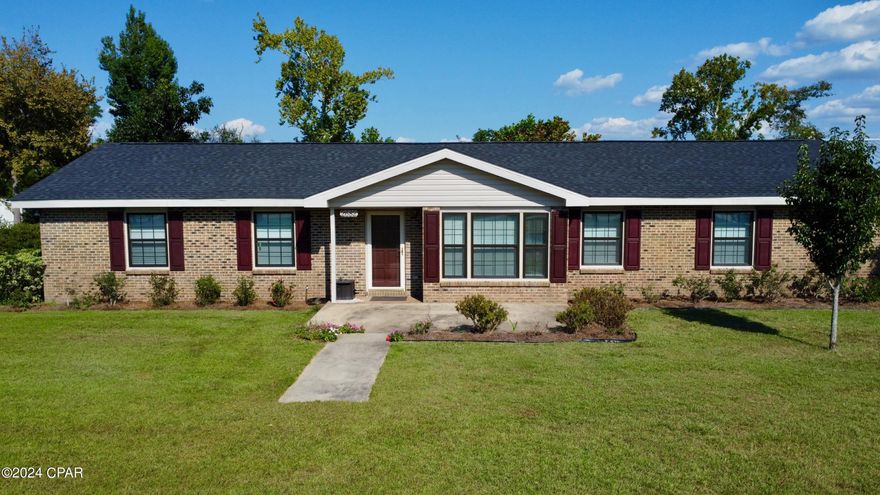 Discover the perfect blend of in-town convenience and serene country living in this spacious 3-bedroom, 2-bathroom home, nestled on 1.3 acres in the desirable Merritts Mill Pond area. This property offers ample space and comfort, with lots of recent updates. The home features both a formal living room and family room, a generously sized kitchen and dining area with plenty of built-in storage, dedicated laundry room and home office, and a screen-in porch overlooking the large backyard. The kitchen is the heart of the home and offers a large, open concept with plenty of counter space, cabinetry and a dedicated dining area perfect for family gatherings.  Appliances are stainless steel and include a gas range. The primary bedroom features an ensuite bath and the second bathroom is conveniently located with hall access for guests. Enjoy both formal and casual living with a traditional living room for hosting guests and a cozy family room for everyday relaxation. The 1.3-acre lot features double fenced areas, an attached carport, two storage sheds, and plenty of space for outdoor activities, gardening, or simply enjoying the peaceful surroundings. 
This home is situated in the popular Merritts Mill Pond area, providing the perfect balance between the tranquility of a quiet and well-established neighborhood and the convenience of being close to town.  You'll enjoy easy access to local amenities, schools, shopping, and dining while savoring the peaceful atmosphere of wide-open spaces.  Minutes to Jackson Blue Springs and the Florida Caverns State Park. Canoe, kayak, or tube the nearby Chipola River.  Florida's beautiful Gulf Coast beaches are a little over an hour's drive, as is the state's capital, Tallahassee. 
Recent updates to the property include: new electrical weather head (2024), pole-barn style carport (2024), new paint throughout home, new front windows (2024), roof (2021), water heater (2024). Don't miss out on this opportunity to own a piece of paradise near Merritts Mill Pond, Marianna!