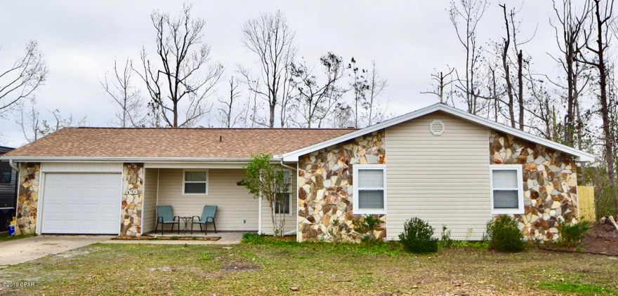 Located on a corner double lot in the heart of Lynn Haven. TOTALLY RENOVATED!!! There are 3 bedrooms and 2 full baths with good closet space and lots of natural light. The bathrooms have been updated with cabinetry, lighting and flooring. The guest bath has a shower/soaking tub combo and the master bath has a beautiful tiled shower. The kitchen is spacious with over and under lighting, new Samsung appliances and newly painted cabinets. If you prefer cooking with gas, there is a hookup behind the stove available. The dining area has a bay window and a door leading to the screened porch overlooking the large fenced yard. There is a 16x16 mother-in-law quarters with electric, cable and a/c. It has a kitchenette, full bath and living area! (Not Included in homes square footage.) Entire main home is wired for backup generator and has 220 volt wiring for a hot tub.