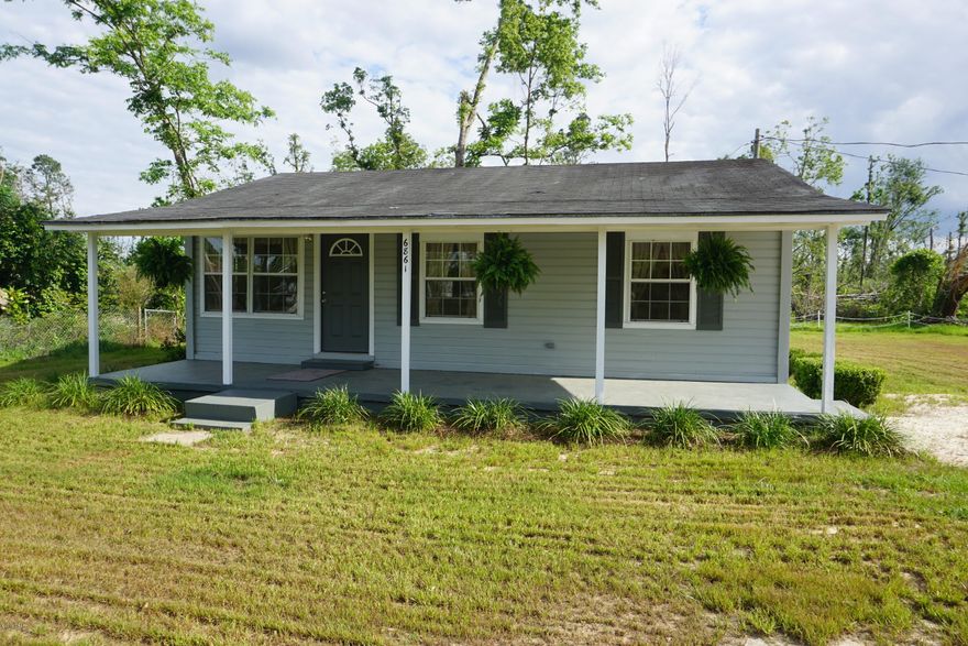 CURRENTLY UNDER CONTRACT, SELLER ACCEPTING BACKUP OFFERS: PRICE REDUCTION!  Beautiful Florida cottage that has been fully remodeled and updated. The home features brand new custom built cabinets with large island and all new appliances. The plumbing is all new and it also has been completely rewired. The walls, ceilings and vinyl floors are all brand new. There is a covered front and back porch and large backyard. The home is located in Grand Ridge, close to schools, shopping, and I-10.