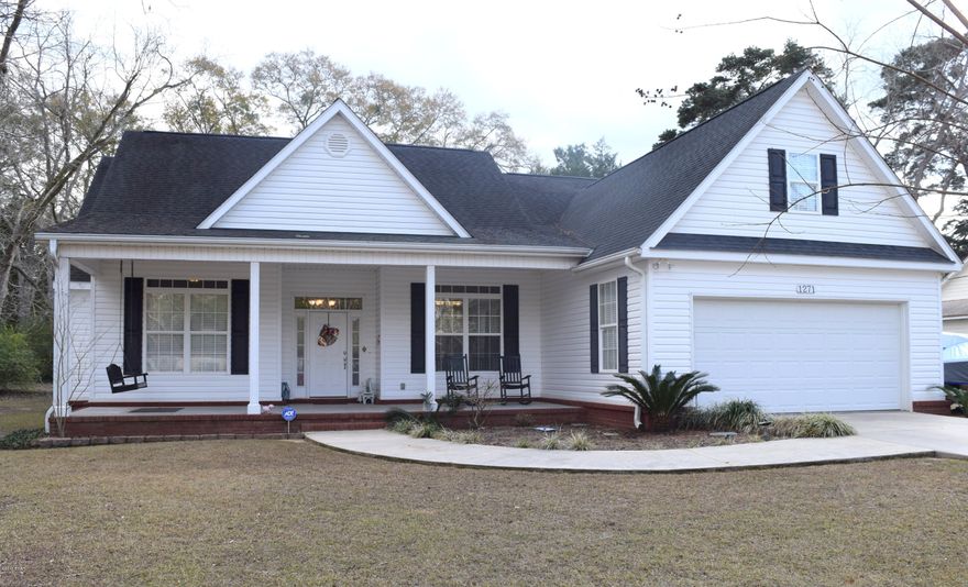 SPECTACULAR 2-STORY CUSTOM BUILT HOME LOCATED IN THE HEART OF CHIPLEY. THIS HOUSE BOASTS A BRIGHT OPEN FLOORPLAN WITH 4 BEDROOMS, 3 BATHS AND OVER 2,300 FEET OF LIVING SPACE. HIGHLIGHTS INCLUDE: EAT-IN KITCHEN WITH STAINLESS STEEL APPLIANCES, SPACIOUS LIVING ROOM WITH 16 FT CATHEDRAL CEILINGS, FORMAL DINING AND A 11X21 BONUS ROOM UPSTAIRS. THE SPACIOUS MASTER SUITE FEATURES TREY CEILING, OVERSIZED WALK-IN CLOSET, DOUBLE VANITY, JETTED TUB AND SEPARATE SHOWER AND A BRAND NEW 5 TON AC SYSTEM. OUTSIDE YOU WILL FIND A PRIVACY FENCED BACK YARD, PATIO AREA WITH FIRE PIT, 2 PORTABLE STORAGE BUILDINGS, LANDSCAPING AND ATTACHED GARAGE. HOME ALSO HAS A CURRENT AND TRANSFERABLE TERMITE BOND.