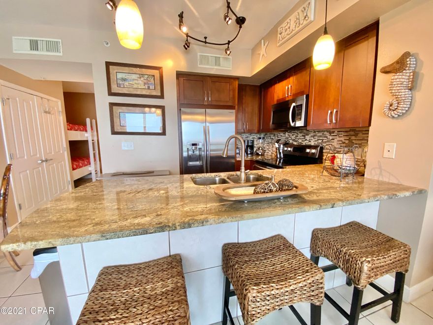 CURRENTLY UNDER CONTRACT, SELLER ACCEPTING BACKUP OFFERS

Beautifully Updated Kitchen including new Cabinetry, Countertops, Backsplash,, and Stainless Samsung appliances.  Built in bunk beds and 2 full baths allow this condo to sleep 6 comfortably.  Additional features include, Tasteful Furnishings; Private Balcony, stackable washer/dryer; and extended tile into the spacious living room and dining area. New water heater in 2019.  Located on the much desired West End of PCB, this unit offers amazing views and all of the amenities for  great vacation rental, producing exceptional rental income, or 2nd home.  2 Pools, one Gulf front & one Indoor/Outdoor; 2 Hot tubs, one Gulf front;  Tennis Court; Fitness Facility;, 4 Level Parking Garage with Climate Controlled Walkover.