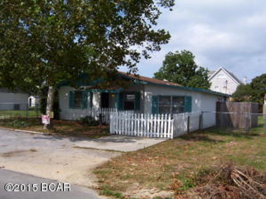 Renovated, large Beach cottage within walking distance to Beach. 3 Bdrms ,2 baths on one side of home, with 4th Bedroom being Mother-in-law style located off kitchen, with private entrance off front porch. Large rooms, renovated with all ceramic tile floors & laminate wood in bedrooms. Freshly painted 2015,newer appliances. Central a/c upgraded in past 3yrs, & thermostat controlled attic fan system. Small pet of 25 lbs or less will be considered with $500 pet deposit. Only 3 stoplights to Pier Park shopping. Oversized lot with drive through gate to rear yard will hold RV or Boat. French doors from Great room has covered patio area for cookouts & area for garden. Large, fully fenced yard.