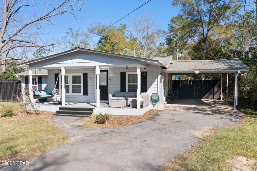 BACK ON THE MARKET - NO FAULT OF THE SELLER - This home is being sold furnished and has everything you need to move right in.  It has an inviting front porch with a swing, covered parking and an amazing fenced in back yard, a workshop with 220 electric in place , firepit, recreational area for the kids and a relaxing patio for the adults. The exterior has been painted to give the home a fresh modern look. Current updates include new appliances, new electric fireplace, new windows on the front of the home, and the water heater has been replaced.  Contact your favorite realtor for a showing today!