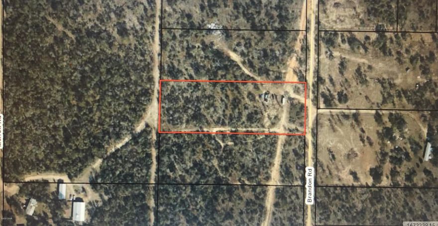 Large 3.33 acre lot in the country with water, septic and power already in place and ready to use. Build your dream home or put a manufactured home on it. Make this your mini farm with horses or just room to roam. Country living but just a short drive to shopping and entertainment in Panama City and only 45 mins to the beautiful beaches! Come see this beautiful home site today!
