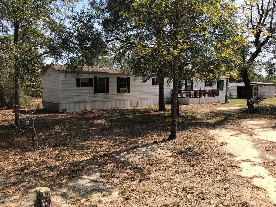 Hurry this one wont last long, this is a handy man special and this home needs some work, a two bedroom two bath mobile home on four acres of land, this home is a short drive to shopping and to Sunset King lake resort, this home is a short commute to 331 and I-10. Reduced for quick sale.